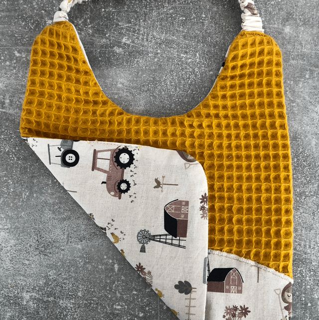Bavoir jaune fermier, à élastique 